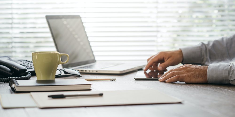businessman-working-at-office-desk.jpg